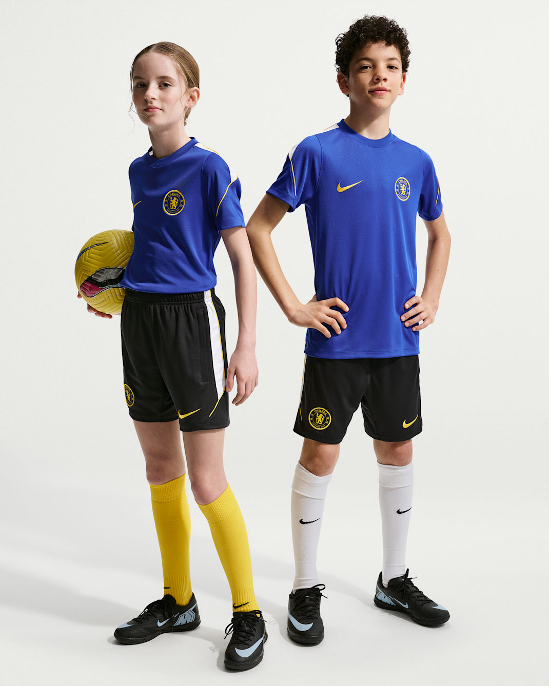 Chelsea F.C. Strike Older Kids' Nike Dri-FIT Football Knit Shorts - Pitch Blue/Midwest Gold/White/Midwest Gold