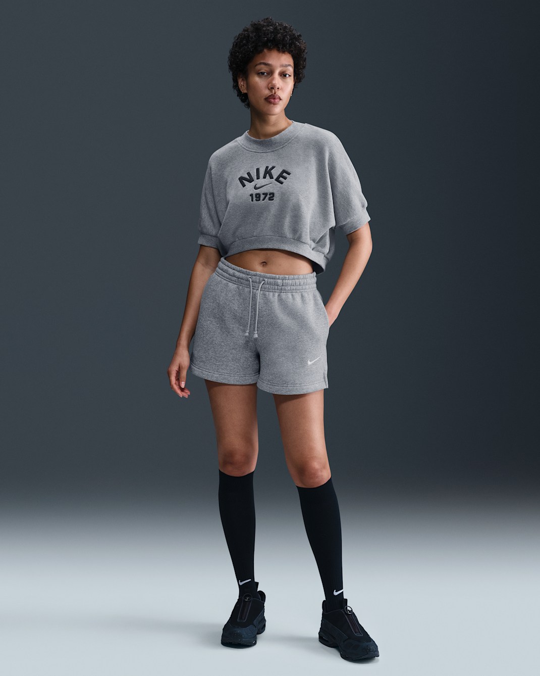 Nike Sportswear Phoenix Fleece Pantalons curts de cintura mitjana de 10 cm - Dona - Gris fosc jaspiat/Sail