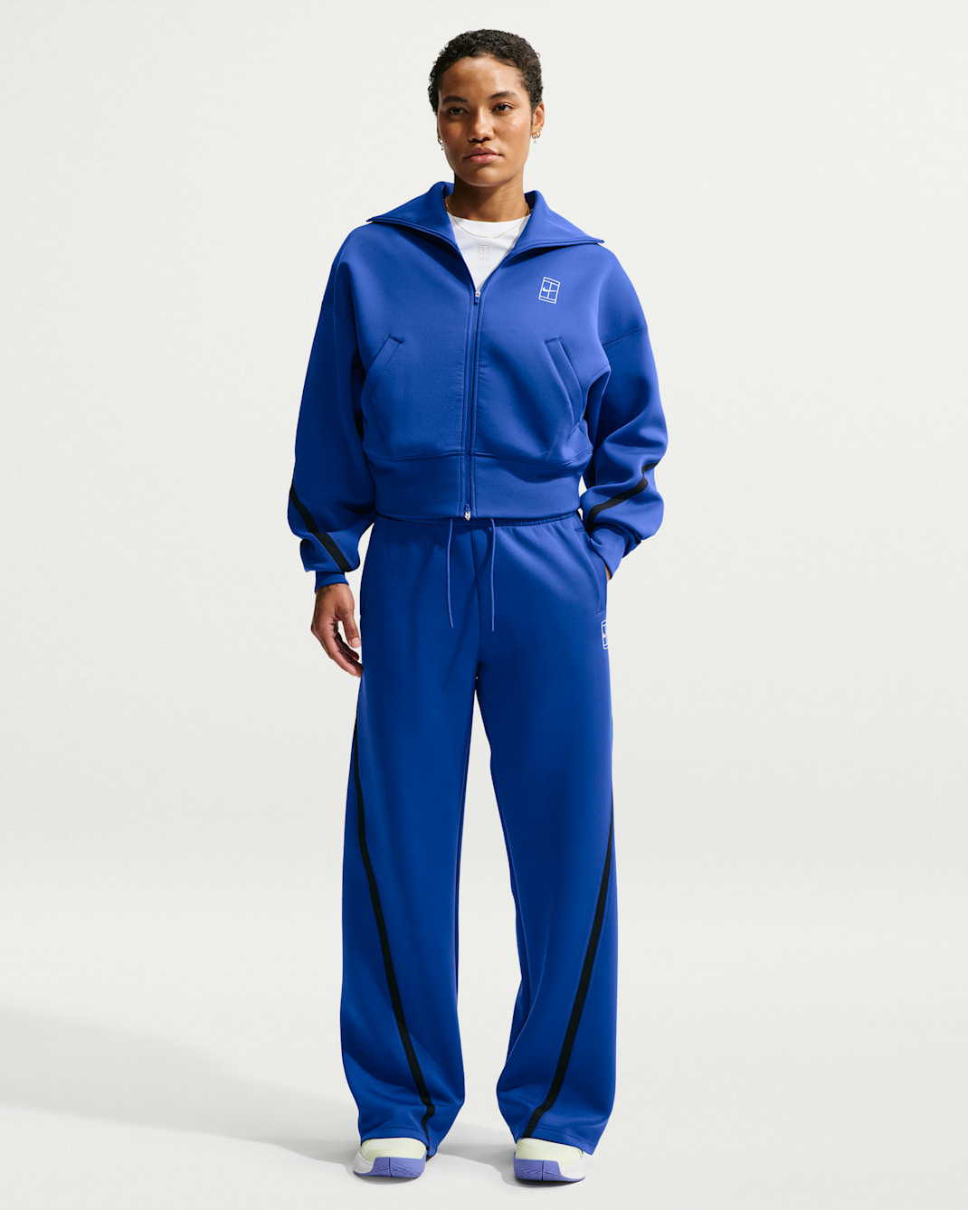 Nike Advantage Pantalons de tennis de cintura mitjana Dri-FIT - Dona - Old Royal/Blanc