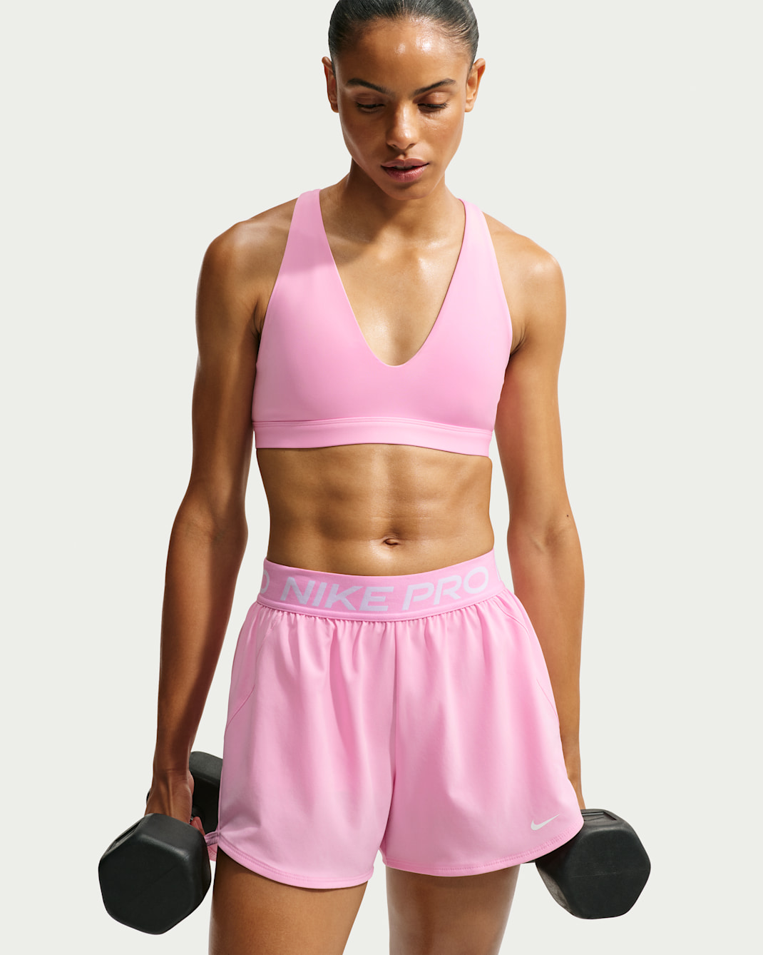 Bra deportivo de baja sujeción para mujer Nike Indy - Rosa amanecer/Negro