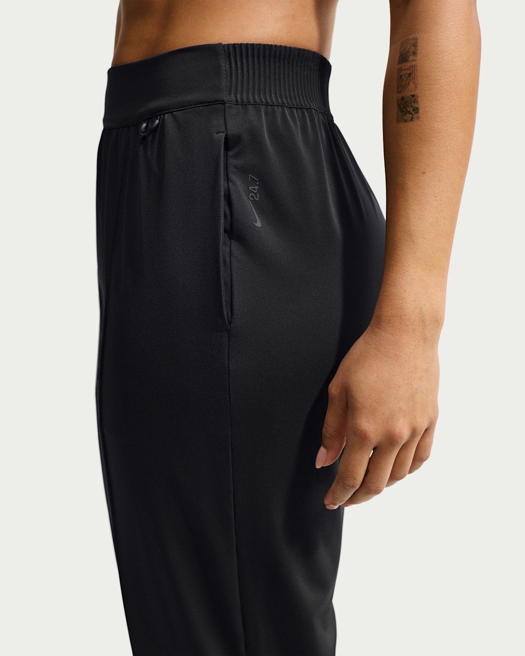 Nike 24.7 PerfectStretch Women's Dri-FIT UV Protection High-Rise Tapered Pants