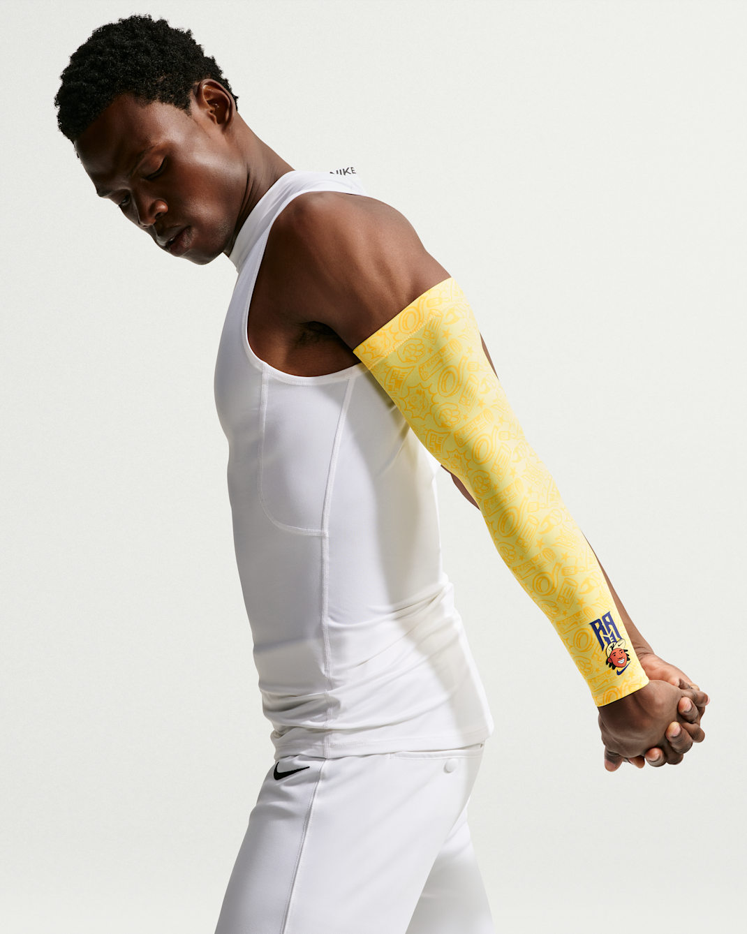 Manga de béisbol Nike Pro Dri-FIT Ronald Acuña Jr. - Naranja láser/Oro medio oeste/Royal intenso