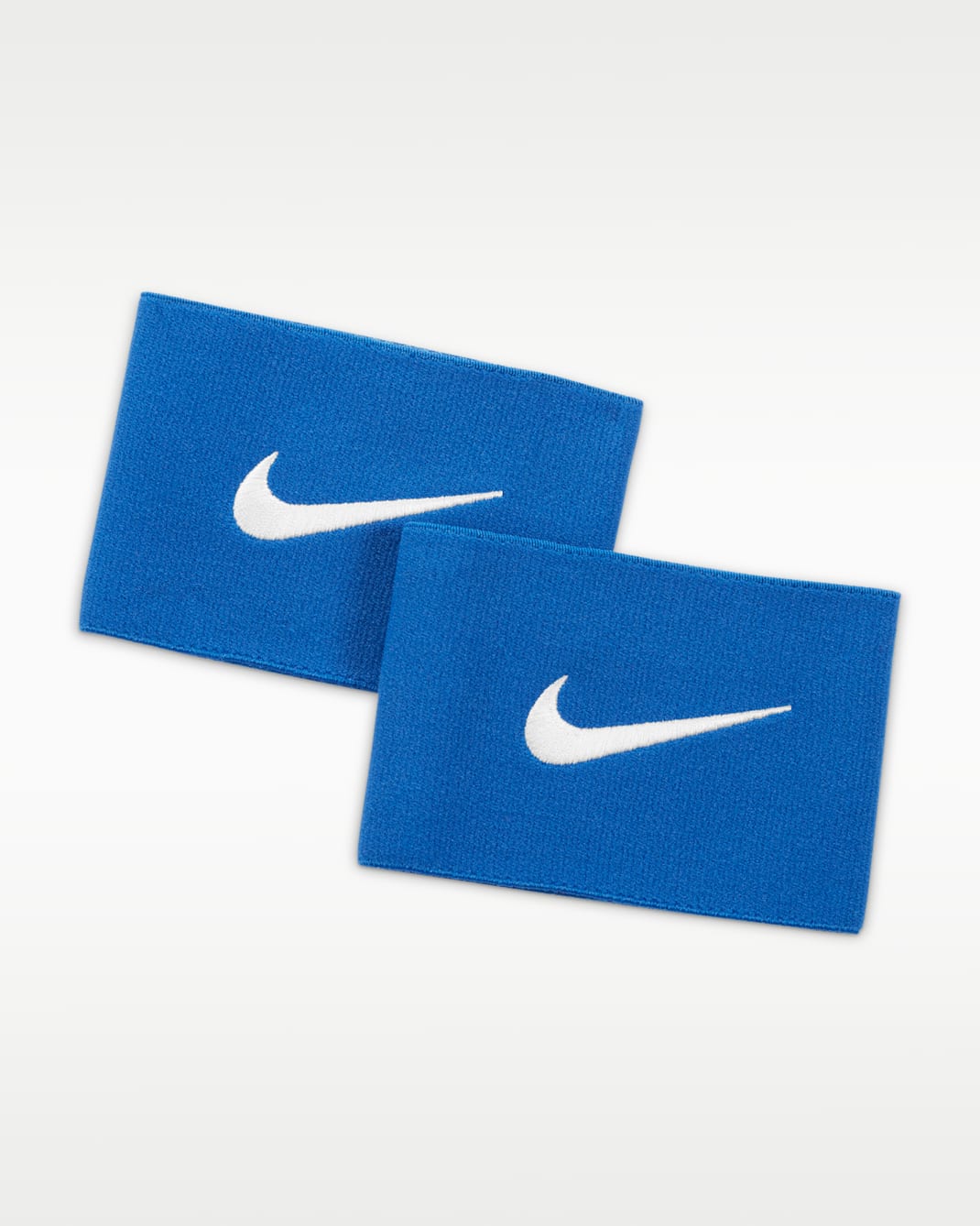 Fotbalový návlek Nike Guard Stay 2 - Varsity Royal/Bílá