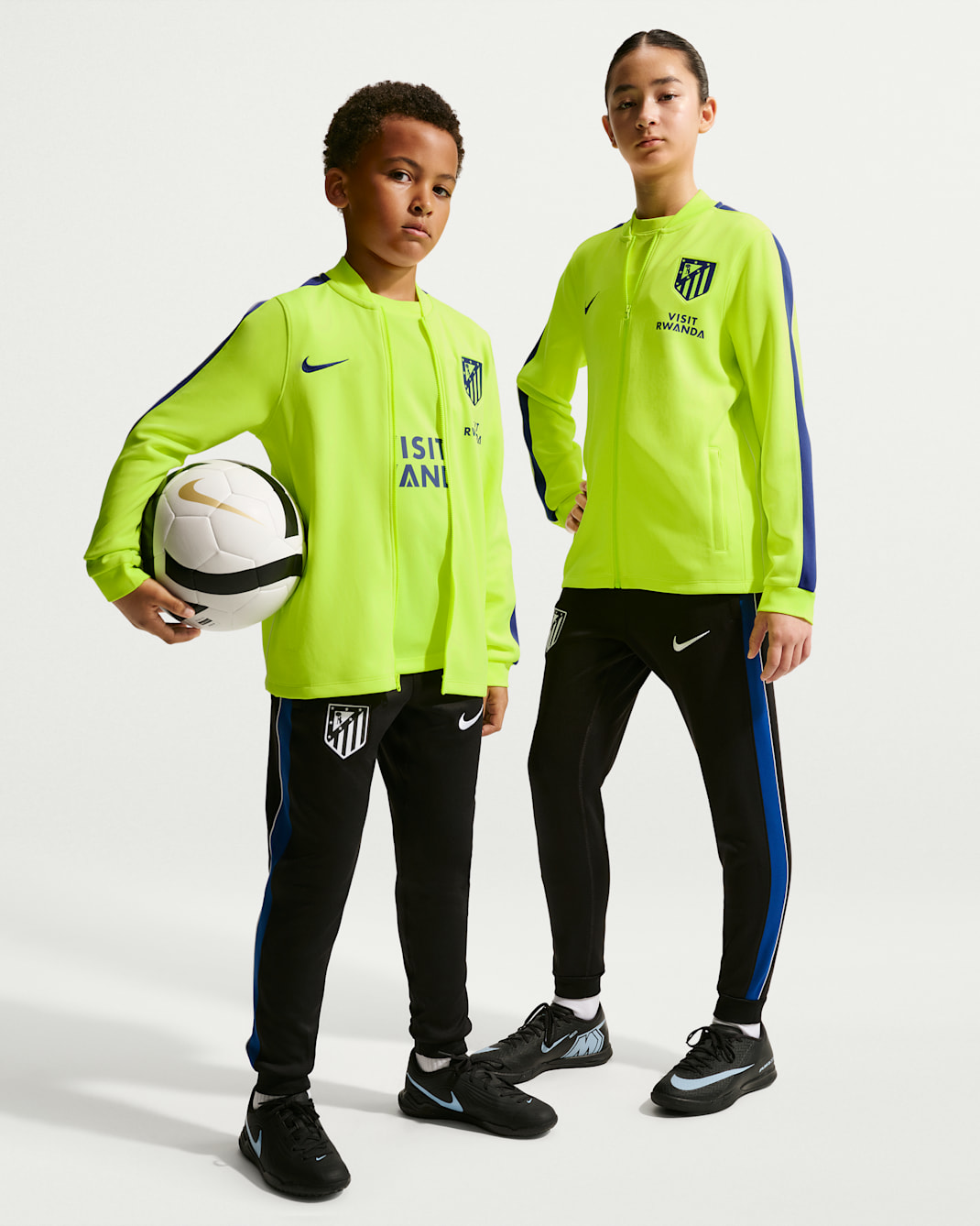 Atlético Madrid Strike Older Kids' Nike Dri-FIT Football Knit Tracksuit - Volt/Black/Deep Royal Blue/Deep Royal Blue