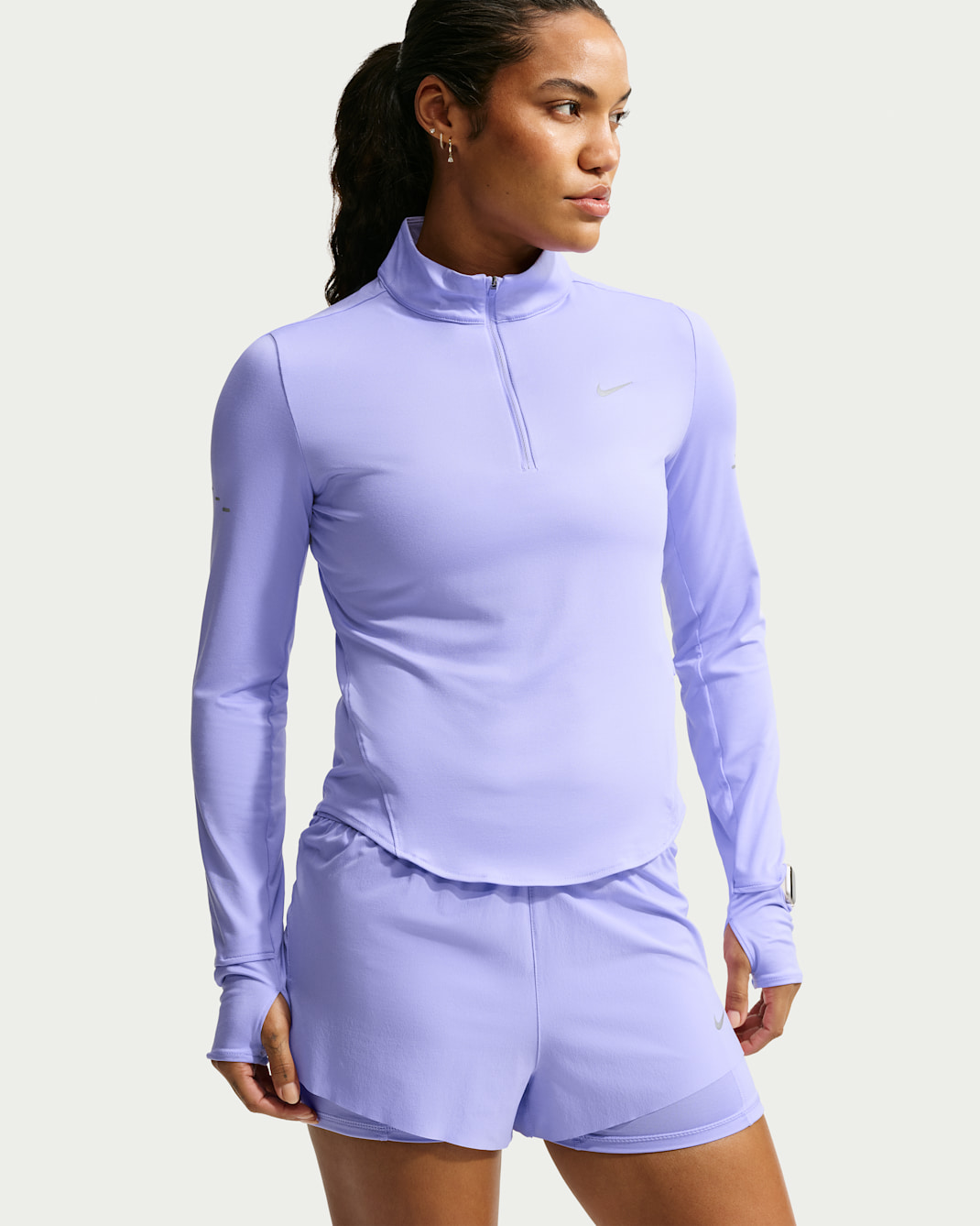 Nike Swift UV-løbetop med Dri-FIT og 1/4 lynlås til kvinder - Purple Pulse