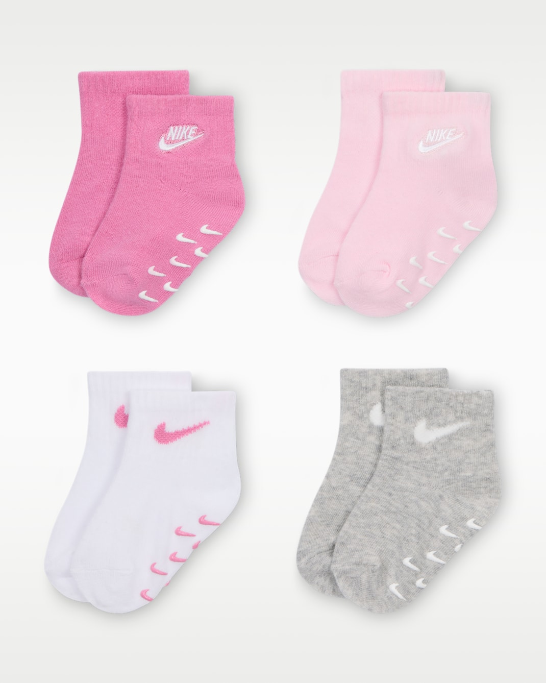 Calcetines con agarre con logotipo para bebé (4 pares) (3 a 6 meses) Nike - Flamenco mágico