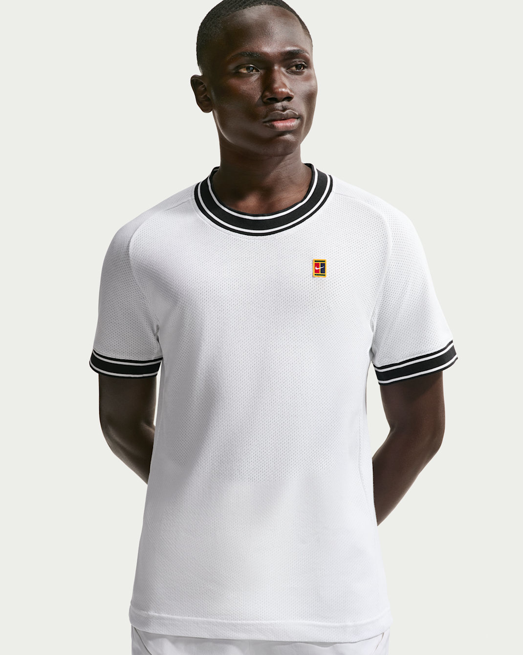 NikeCourt Heritage Kurzarm-Tennisoberteil für Herren - Weiß/Schwarz