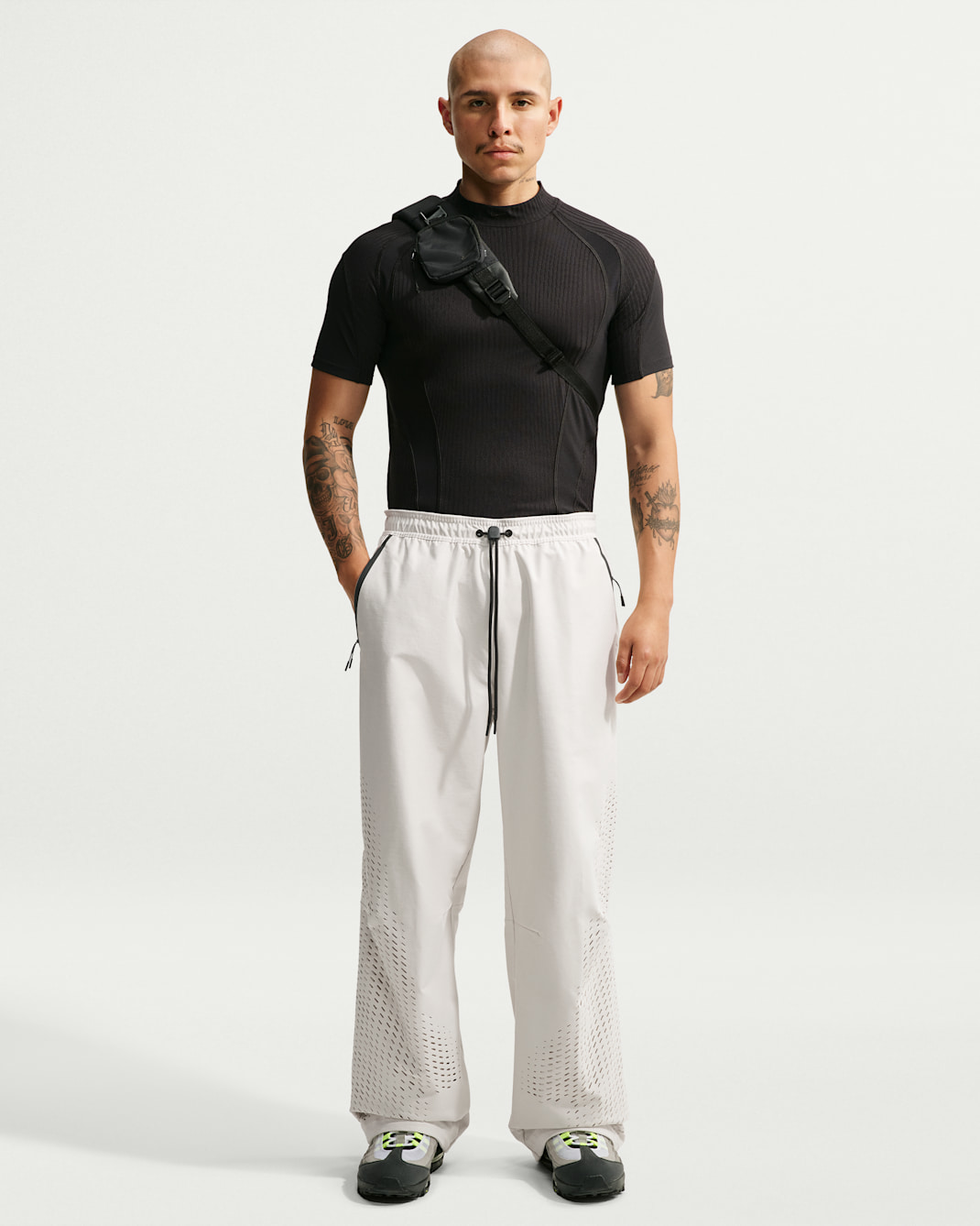Pantalon Dri-FIT en maille Shori à ourlet ouvert Nike Tech pour homme - Light Bone/Noir