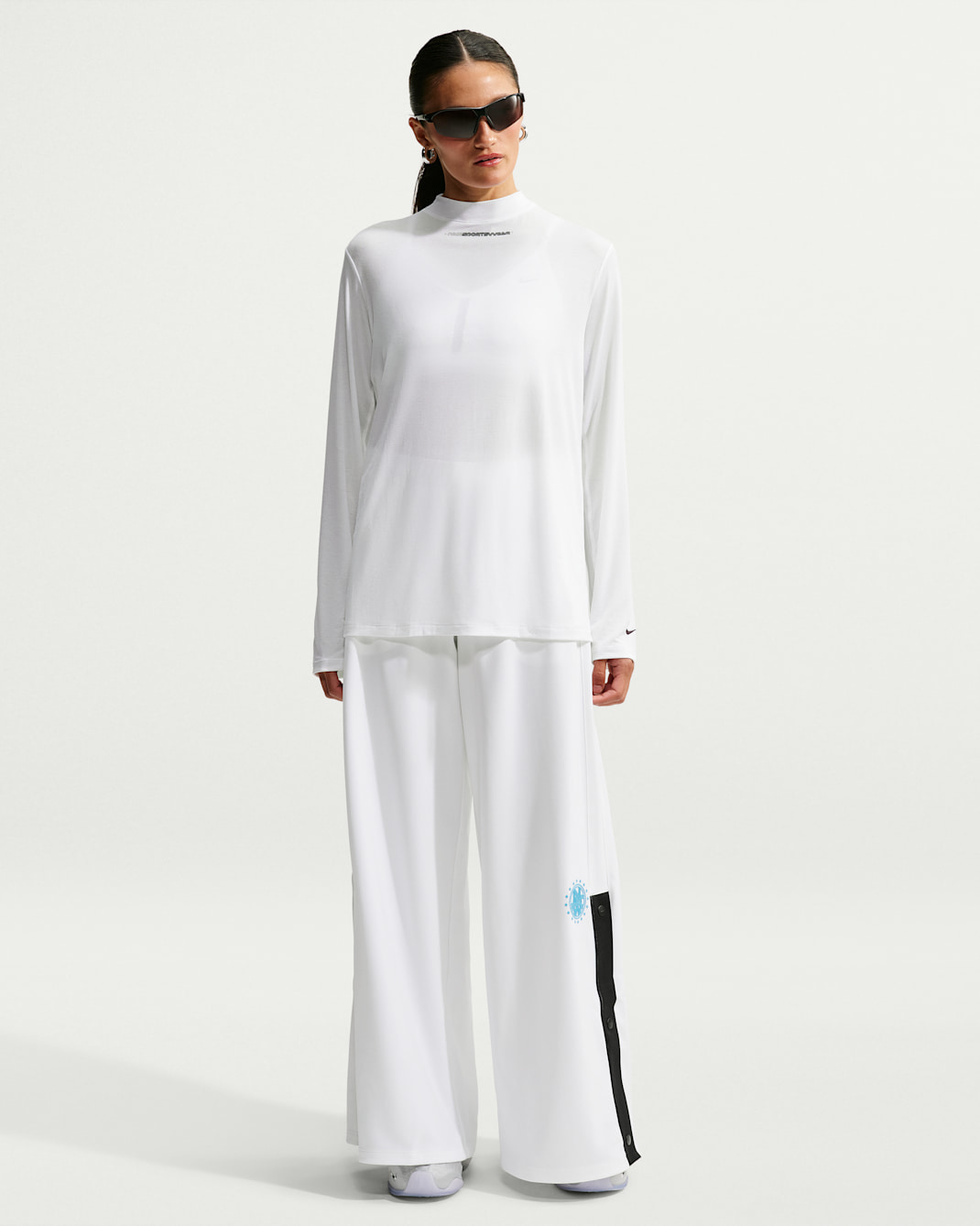 Pants de tejido Knit de poliéster de tiro medio y pierna ancha holgados para mujer Nike Sportswear - Blanco/Negro/Azul báltico/Negro