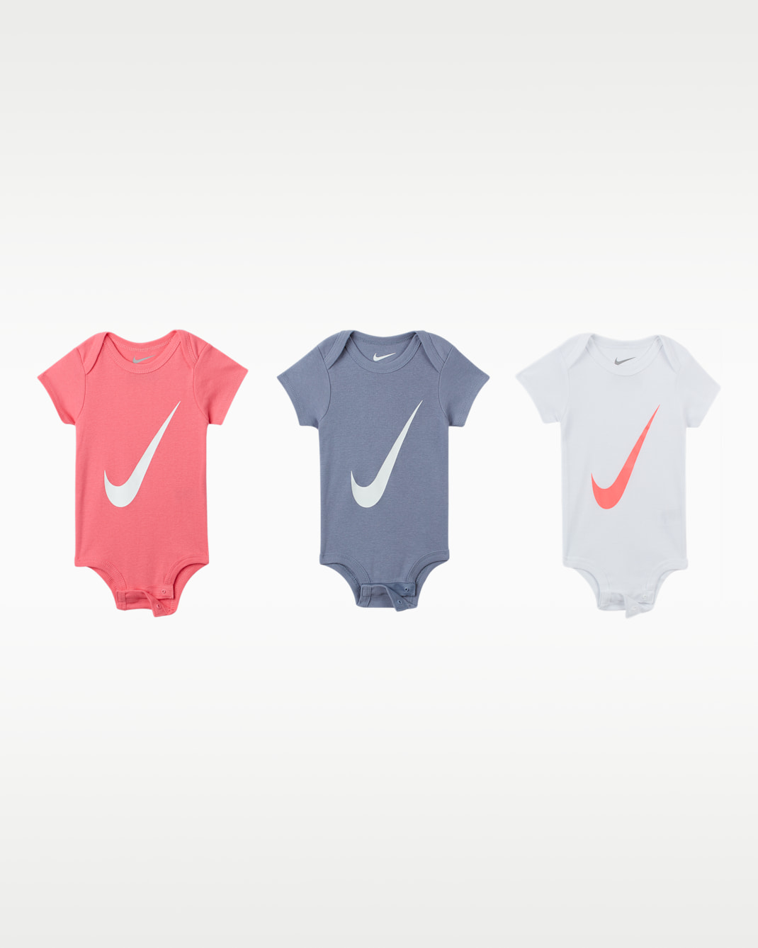 Lot de trois bodys Nike pour bébé (0 - 6 mois) - Pink Nebula