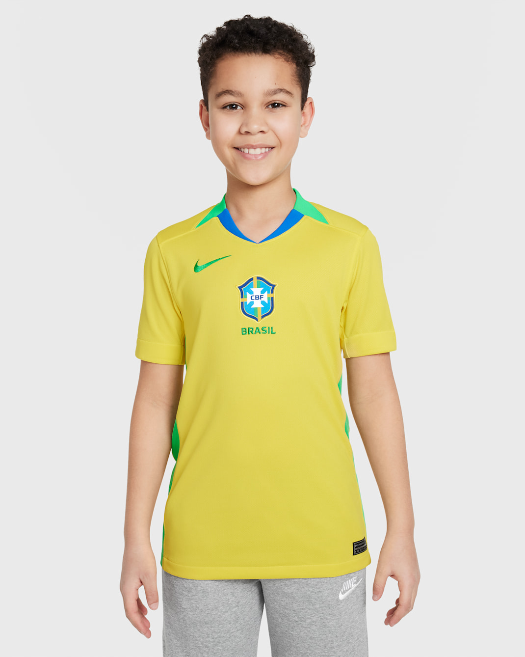 Jersey de fútbol Nike Dri-FIT Replica de Brasil (selección femenina) local 2025 Stadium para niños talla grande - Relámpago/Verde chispa/Verde chispa
