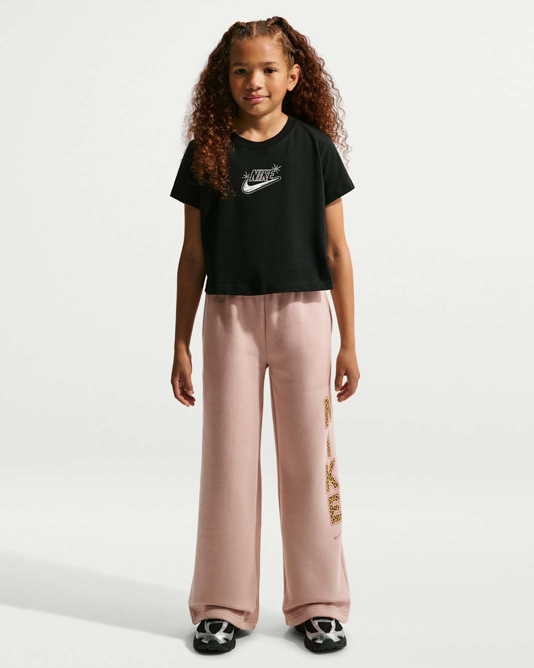 Pants de tejido Fleece con dobladillo abierto para niña talla grande Nike Sportswear Studio - Malva piedra