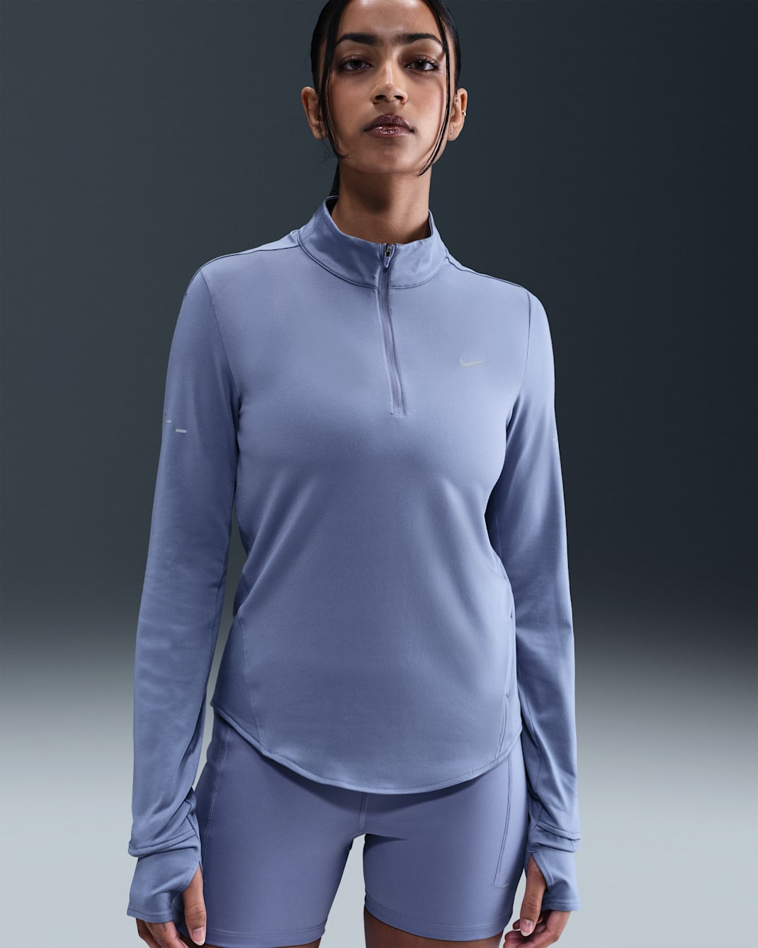 Playera de correr Dri-FIT UV de cierre de 1/4 para mujer Nike Swift - Índigo mundial