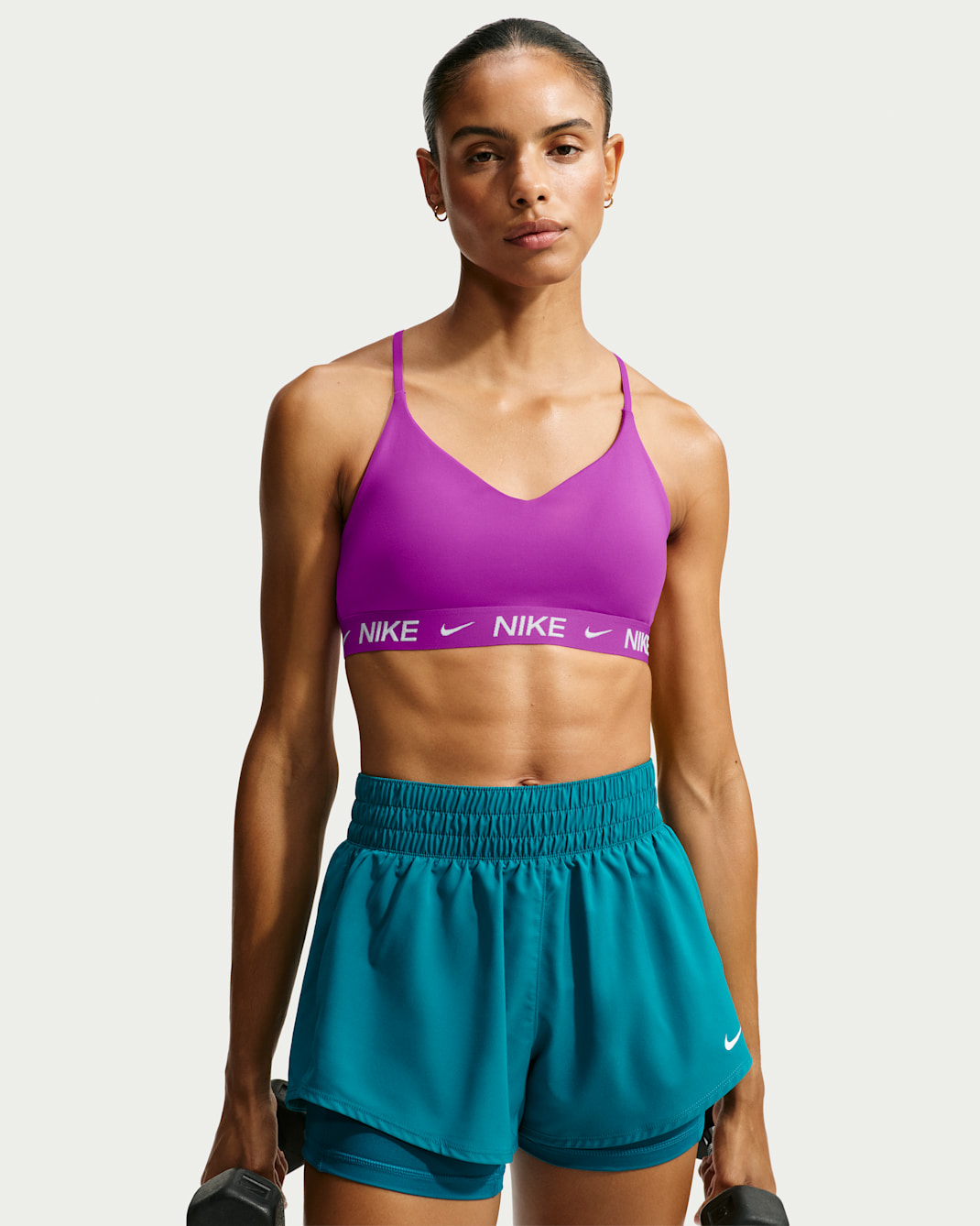 Damski regulowany stanik sportowy z wkładkami Nike Indy Light Support - Vivid Purple