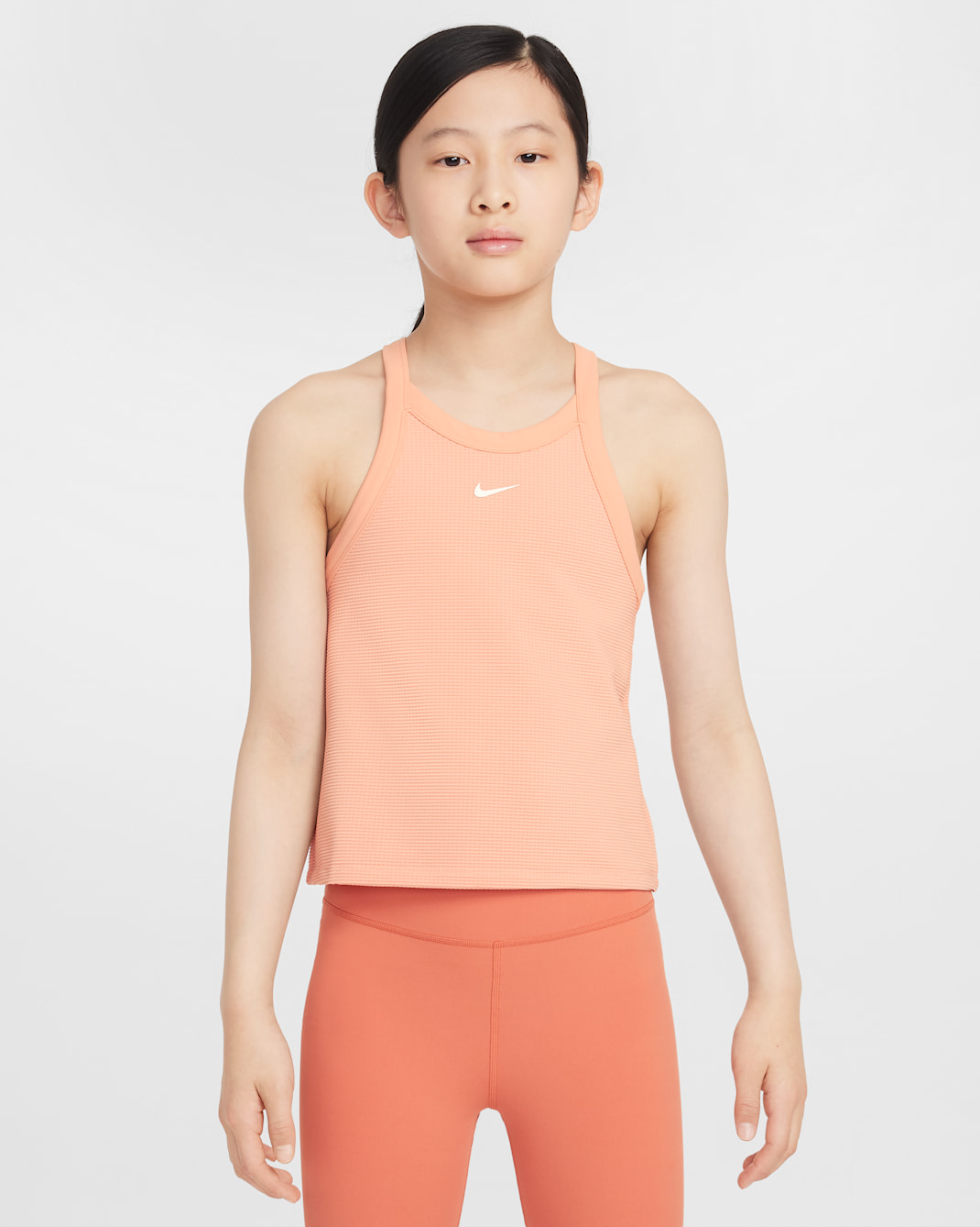 Camiseta de tirantes de cuello alto para niña Nike - Ágata melocotón/Blanco