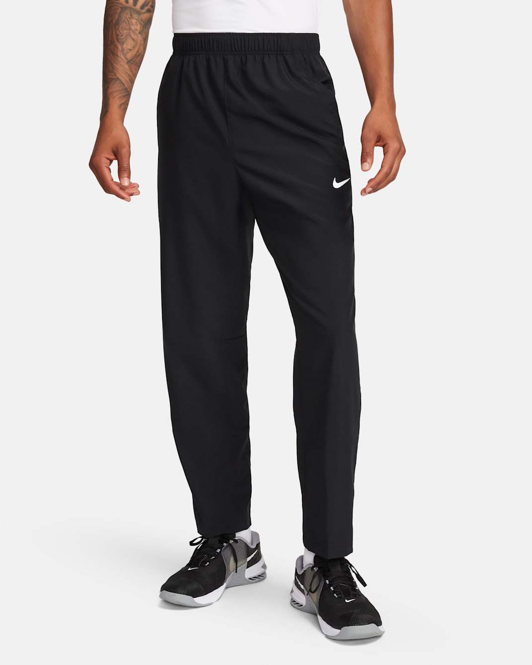 Pants Dri-FIT versátiles con dobladillo abierto para hombre Nike Form - Negro/Negro