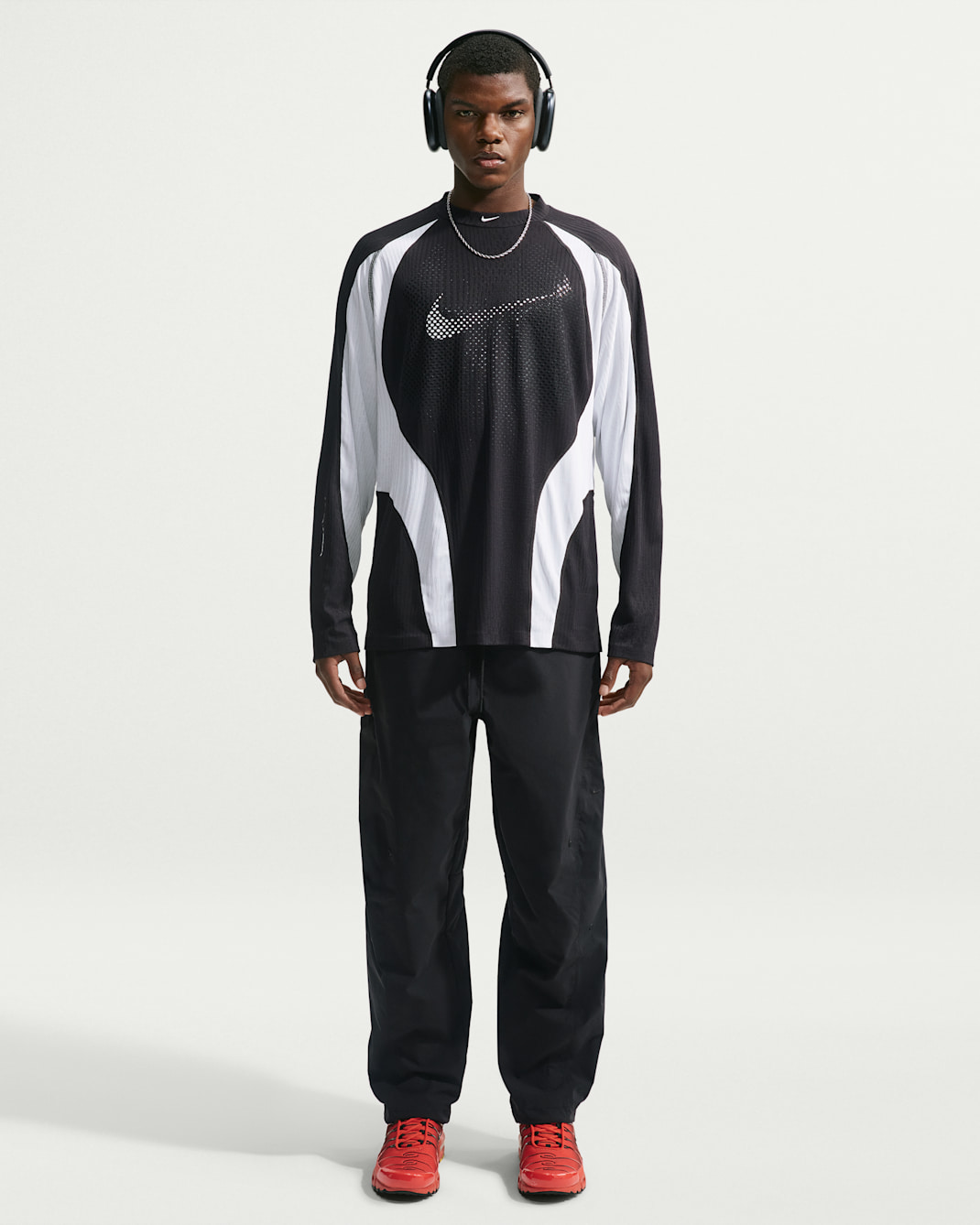 Pantaloni Dri-FIT con orlo aperto Nike Tech Helios – Uomo - Nero/Nero