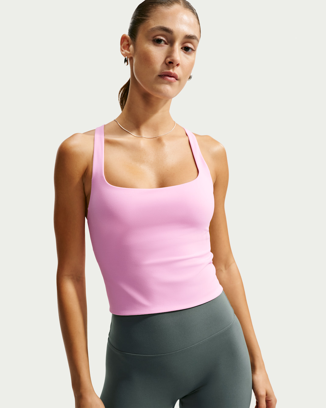 Camiseta de tirantes con bra deportivo de baja sujeción para mujer Nike Zenvy - Rosa amanecer/Gris azulado
