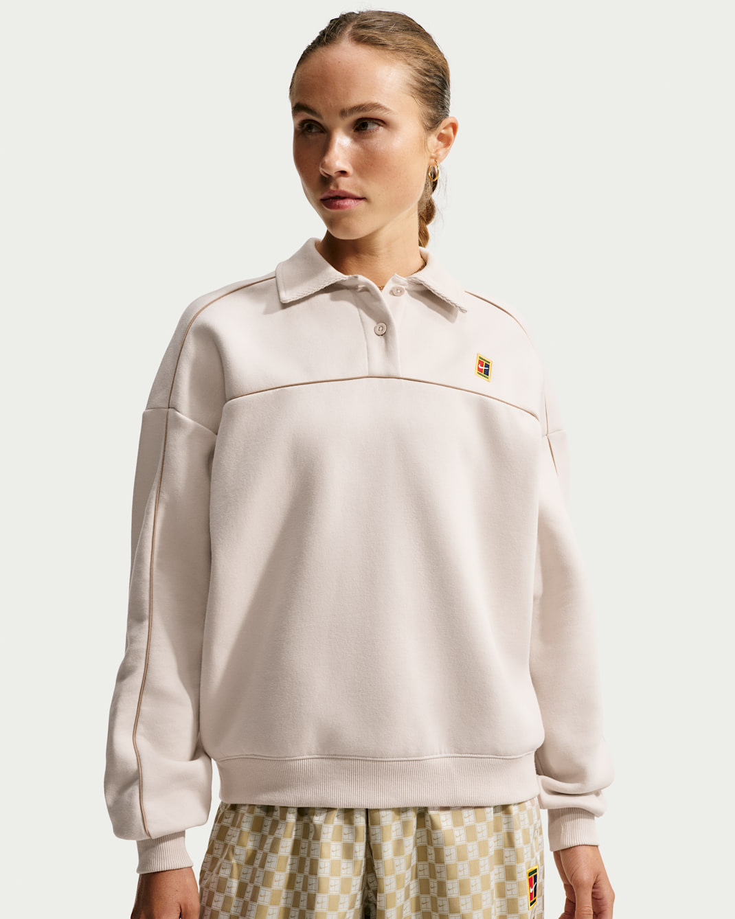 NikeCourt Court Collection Women's Long-Sleeve Fleece Tennis Top - Light Orewood Brown