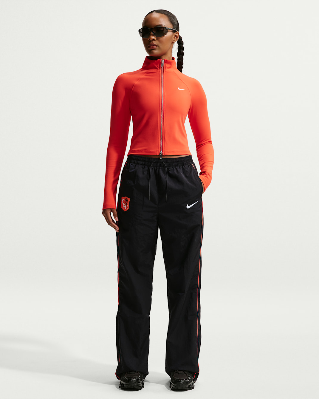 Chelsea F.C. Windrunner Women's Nike Football High-Waisted Open-Hem Pants - Pitch Blue/Pitch Blue/Turf Orange/White