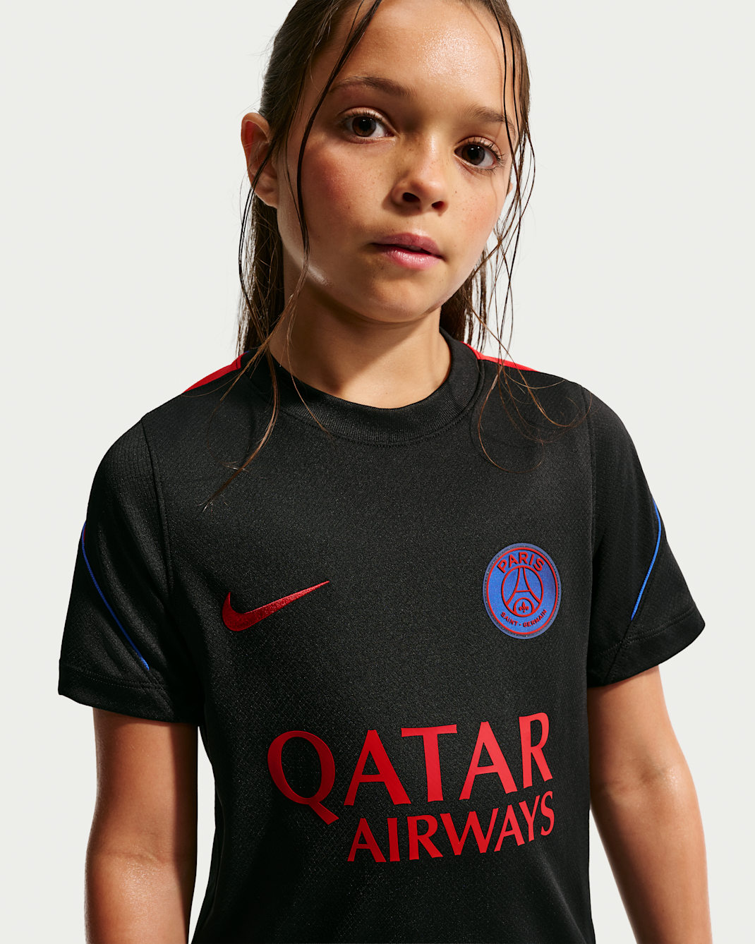 Paris Saint-Germain Strike Big Kids' Nike Soccer Dri-FIT Short-Sleeve Top