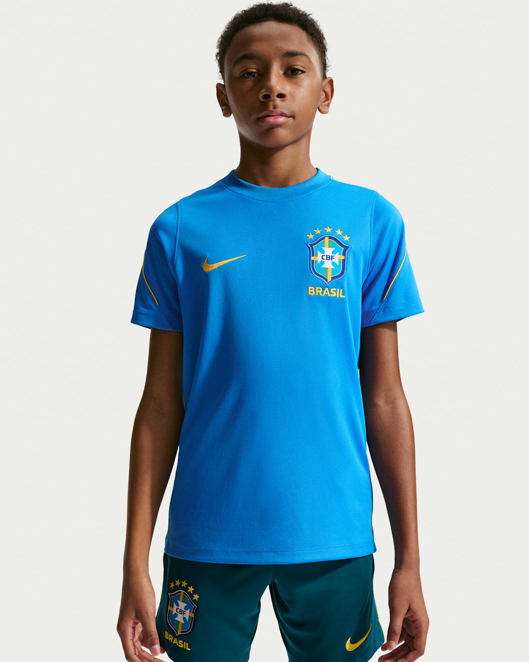 Brazil Strike Big Kids' Nike Soccer Dri-FIT Short-Sleeve Top - Light Photo Blue/Light Menta/Midwest Gold