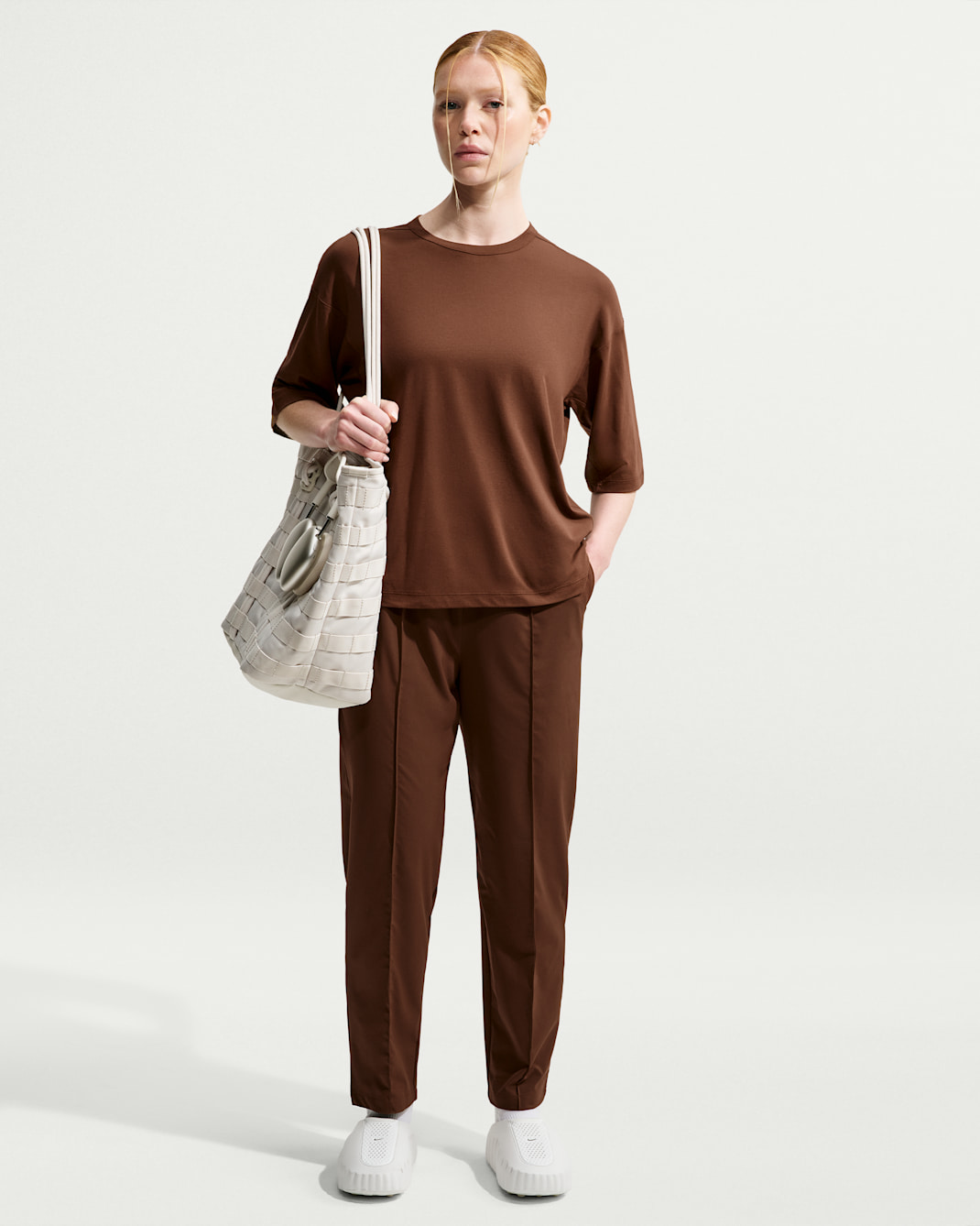 Nike 24.7 PerfectStretch Women's Dri-FIT UV Protection High-Rise Tapered Pants - Cacao Wow/Mosswood Brown