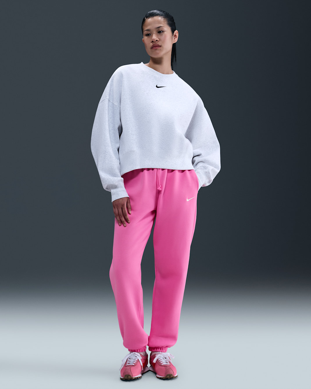 Pants de entrenamiento oversized de tiro alto para mujer Nike Sportswear Phoenix Fleece - Rosa alegre/Vela