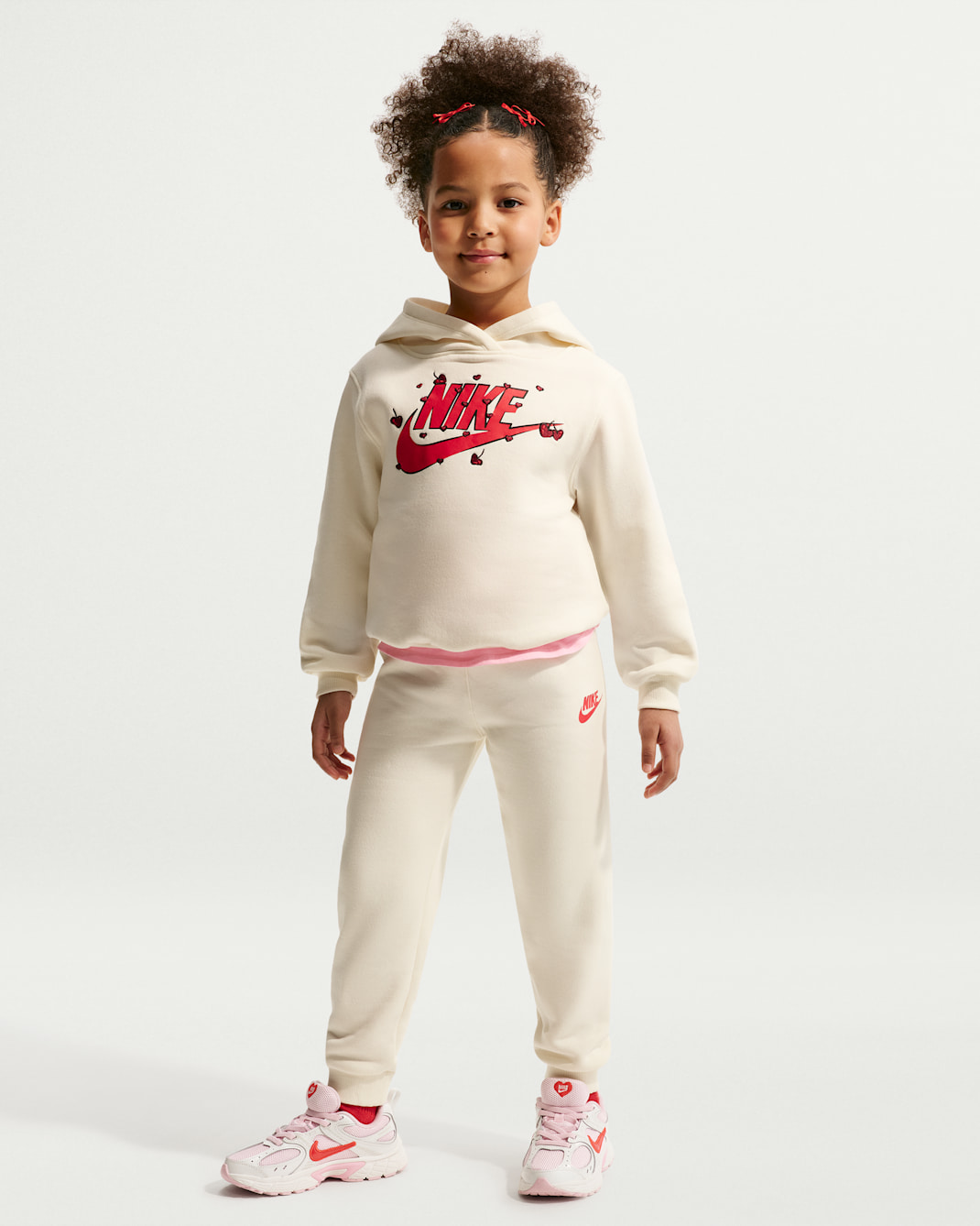 Conjunto de sudadera con gorro sin cierre y joggers de tejido Fleece para niños talla pequeña Nike - Marrón