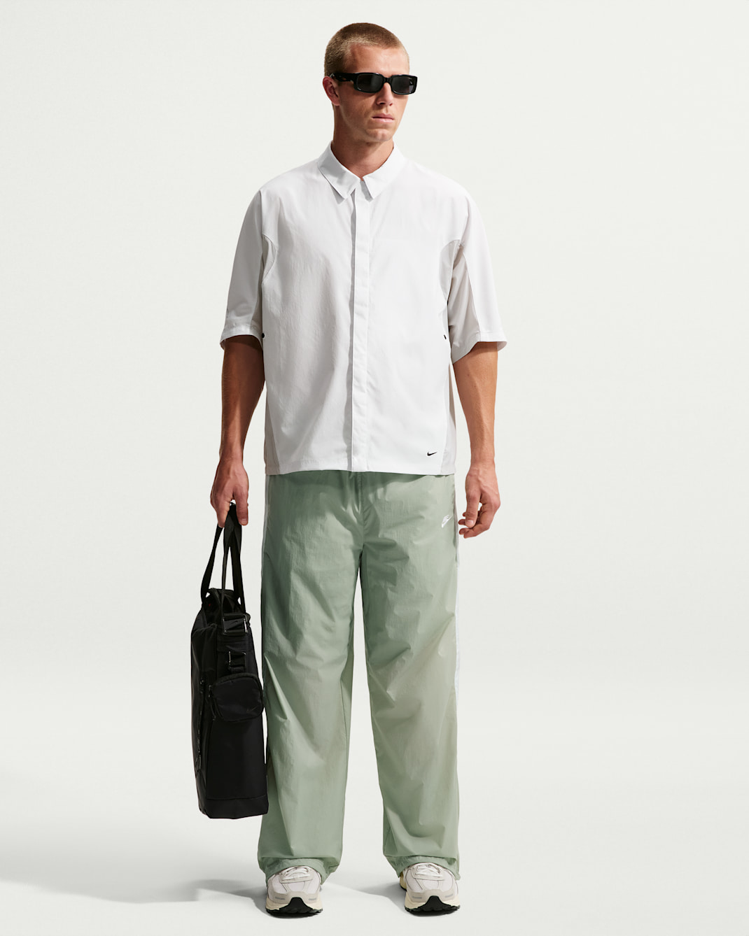 Nike Windrunner Men's Lightweight UV Pants - Jade Horizon/Barely Green/White