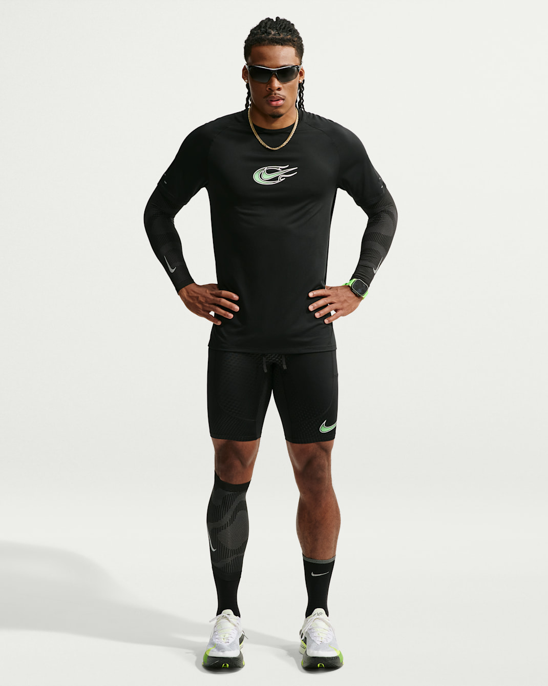 Legging de running demi-longueur Dri-FIT Nike Stride pour homme - Noir/Illusion Green/Blanc