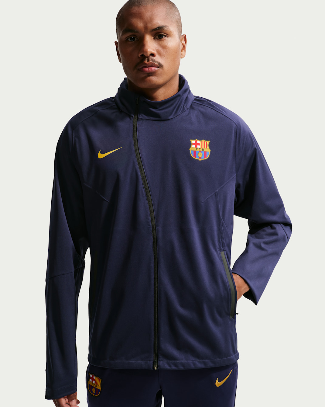 FC Barcelona Strike Shield Men's Nike Soccer Hooded Rain Jacket - Blackened Blue/Mineral Yellow