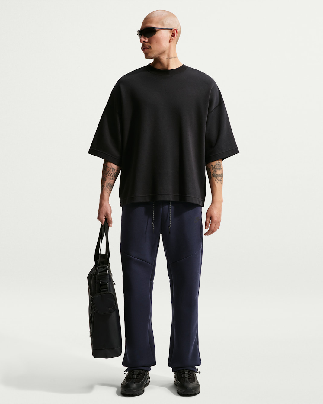 Pantalon à ourlet ouvert en Fleece Nike Tech pour homme - Obsidian/Noir