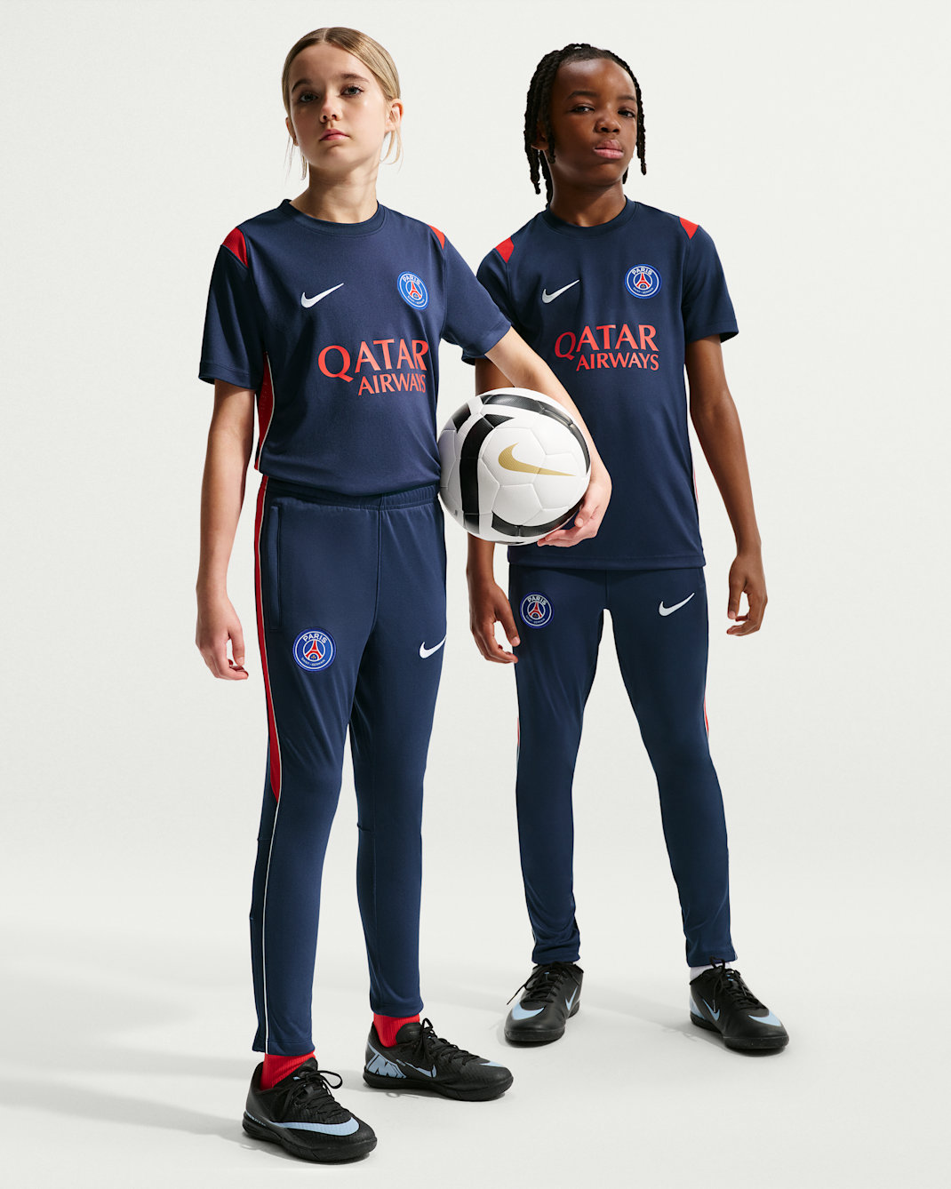 Paris Saint-Germain Academy Pro Older Kids' Nike Dri-FIT Football Knit Pants - Midnight Navy/University Red/White/White