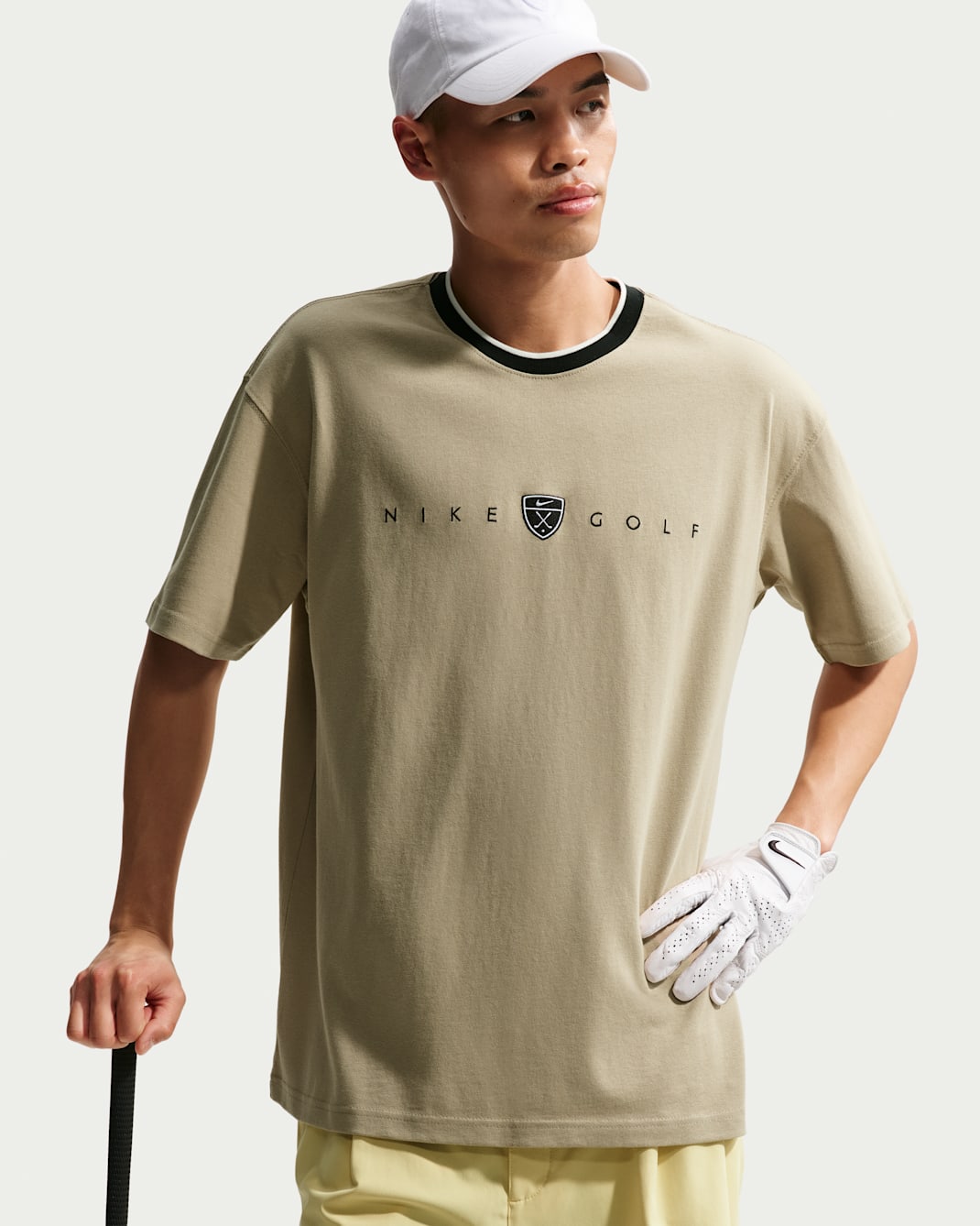 Playera de golf de corte holgado para hombre Nike - Caliza