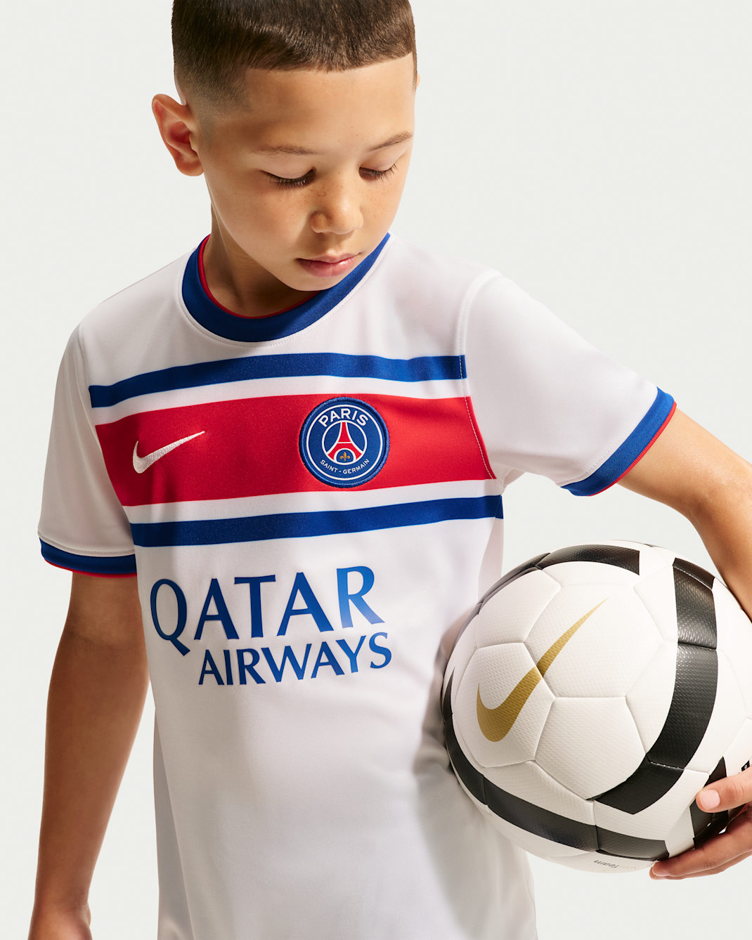 Paris Saint-Germain Home Big Kids' Nike Dri-FIT Soccer Pre-Match Top