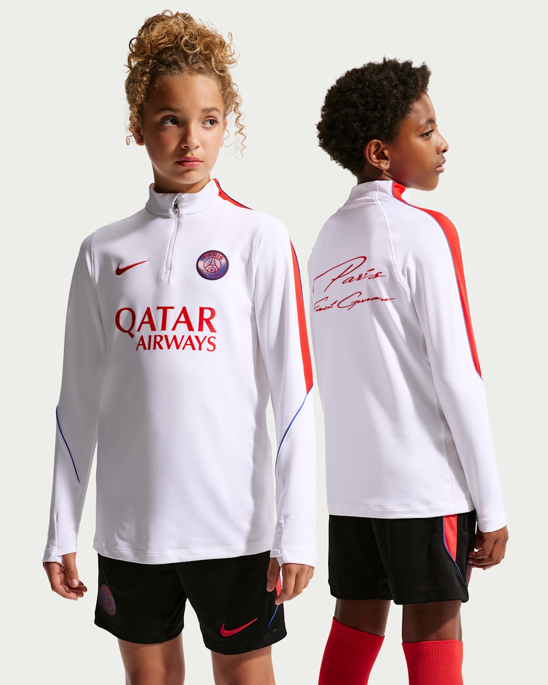 Maskinstrikket Paris Saint-Germain Strike Nike Dri-FIT-fodboldtræningstrøje til større børn - hvid/Global Red/Global Red