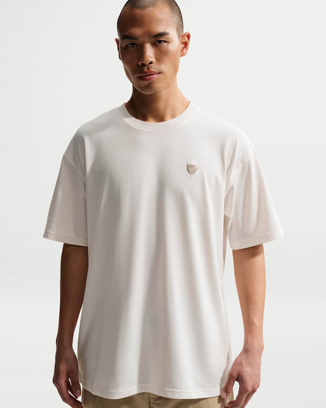 Playera de golf holgada Nike Dri-FIT para hombre - Vela