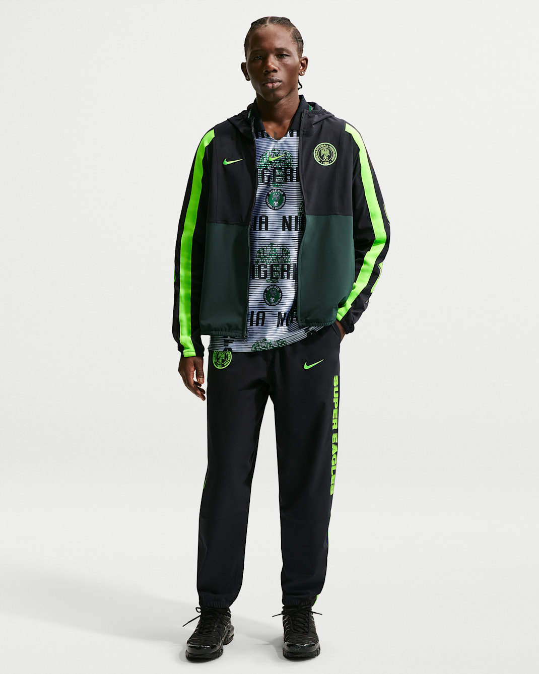 Pantaloni Nike Football Nigeria Energy in tessuto con Dri-FIT – Uomo - Nero/Electric Green