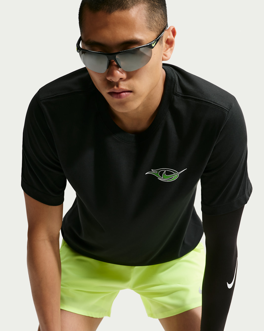 T-shirt da running Dri-FIT Nike – Uomo - Nero/Mean Green/Bianco