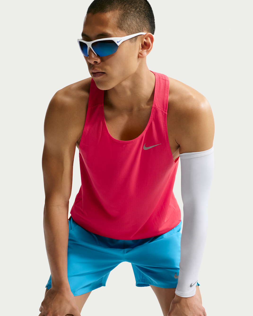 Pánské běžecké tílko Dri-FIT Nike Fast - Fusion Red