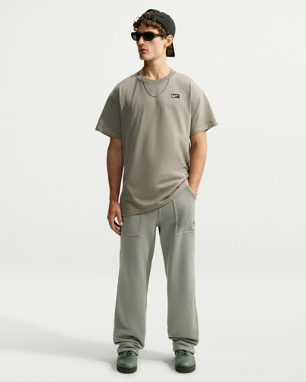 Nike Sportswear fleece herenbroek met open zoom - Dark Stucco