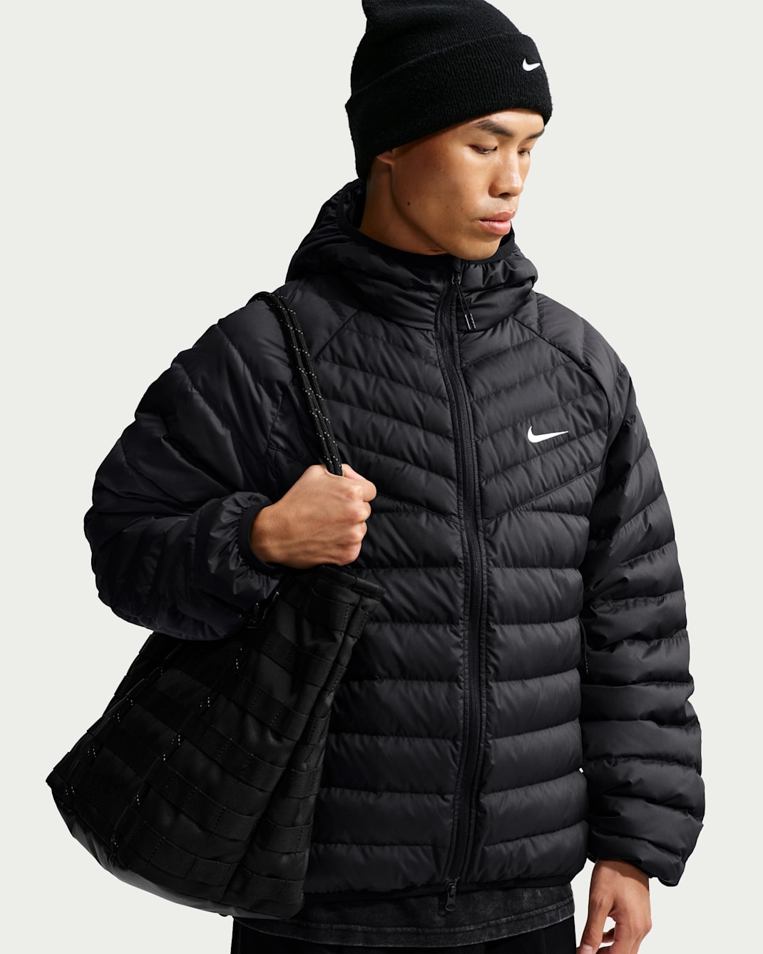 Giacca in piumino leggero Microchannel Nike Windrunner – Uomo - Nero/Bianco