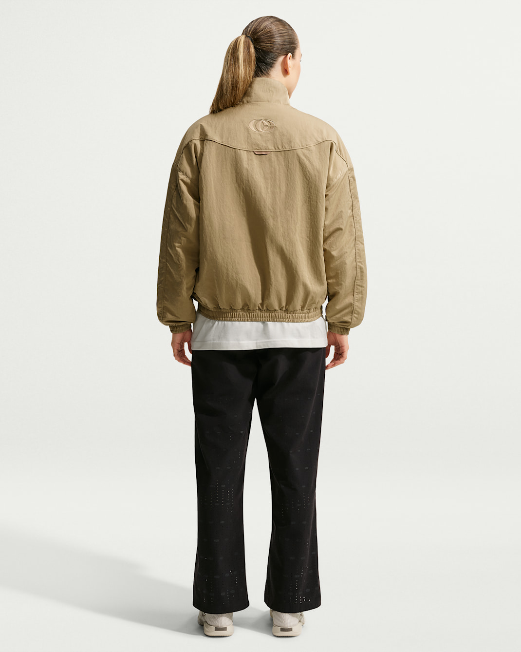Caitlin Standard Issue Women’s Dri-FIT Game Woven Synthetic-Fill Basketball Jacket