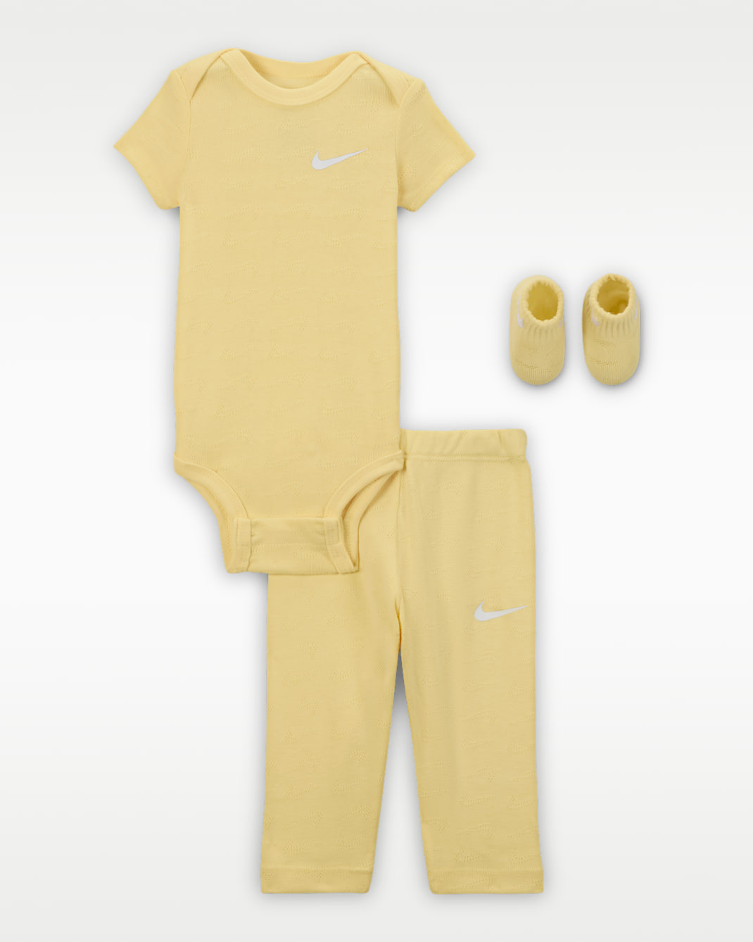 Conjunto de 3 piezas de tejido pointelle para bebé Nike - Amarillo suave