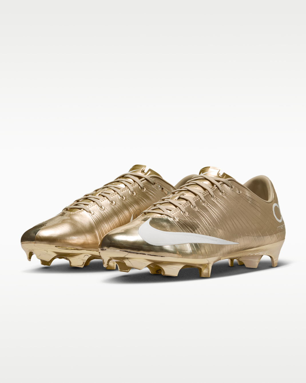 Cristiano Ronaldo x Nike Mercurial Superfly RGN Gold lateral view showing full metallic gold upper and white Swoosh