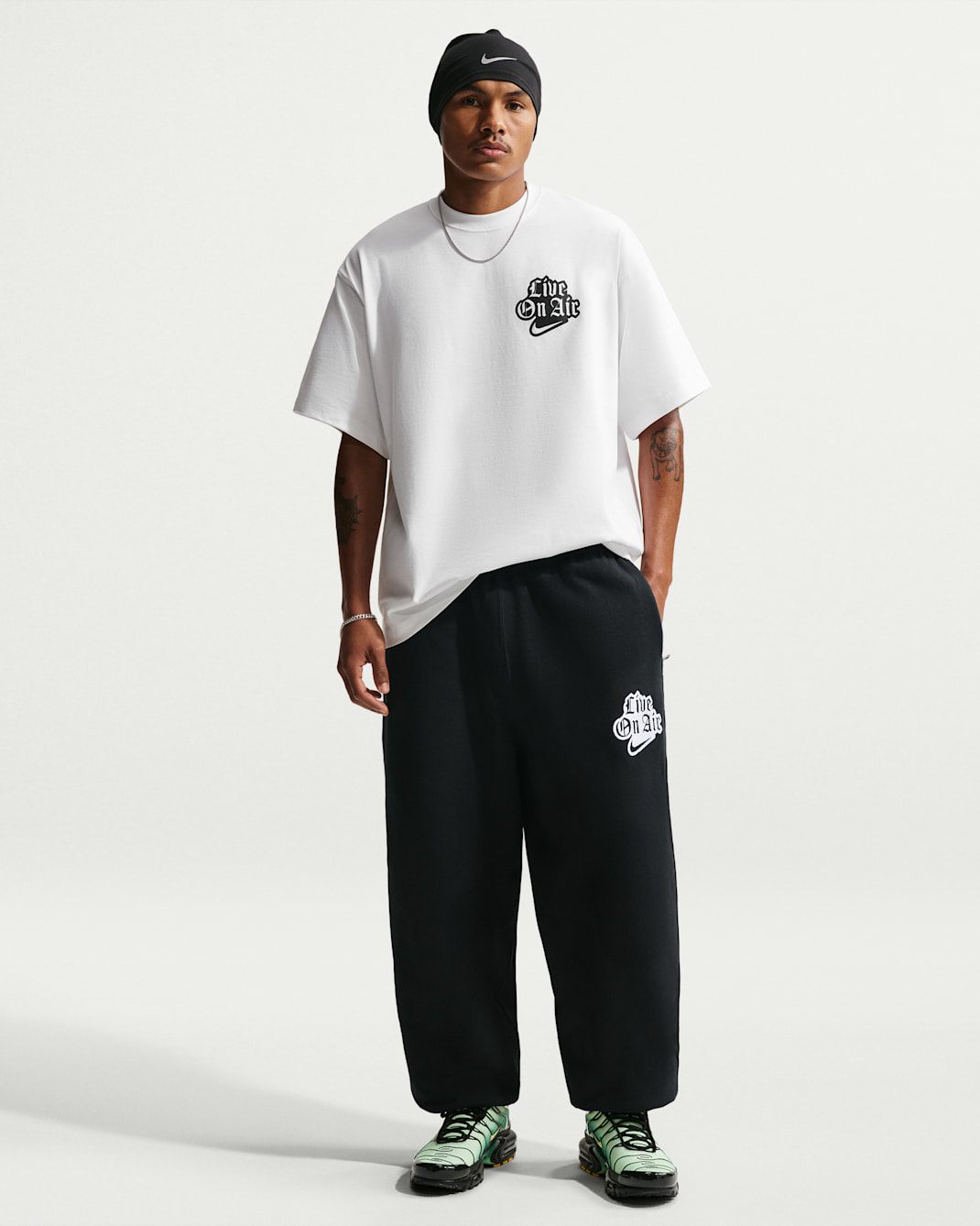 Nike Solo Swoosh Men's Cuffed Fleece Trousers - Black