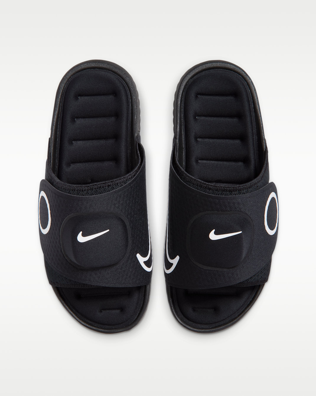 Nike Air Zoom Hyperslide heel view showing ridged rubber outsole with concentric circular traction