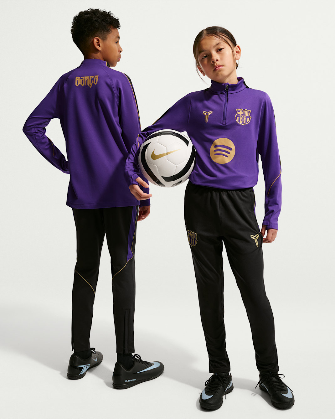 FC Barcelona Strike Away Big Kids' Kobe Dri-FIT Soccer Knit Pants - Black/Field Purple/Metallic Gold