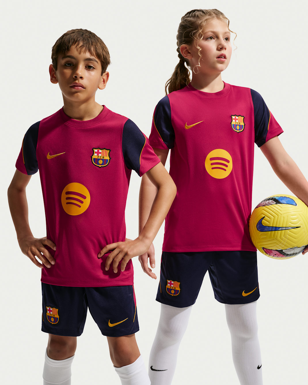 F.C. Barcelona Strike Older Kids' Nike Football Dri-FIT Short-Sleeve Top - Noble Red/Blackened Blue/Noble Red/Mineral Yellow